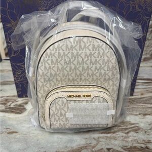 Michael Kors Mini Backpack in Vanilla Monogram with Gold Hardware
